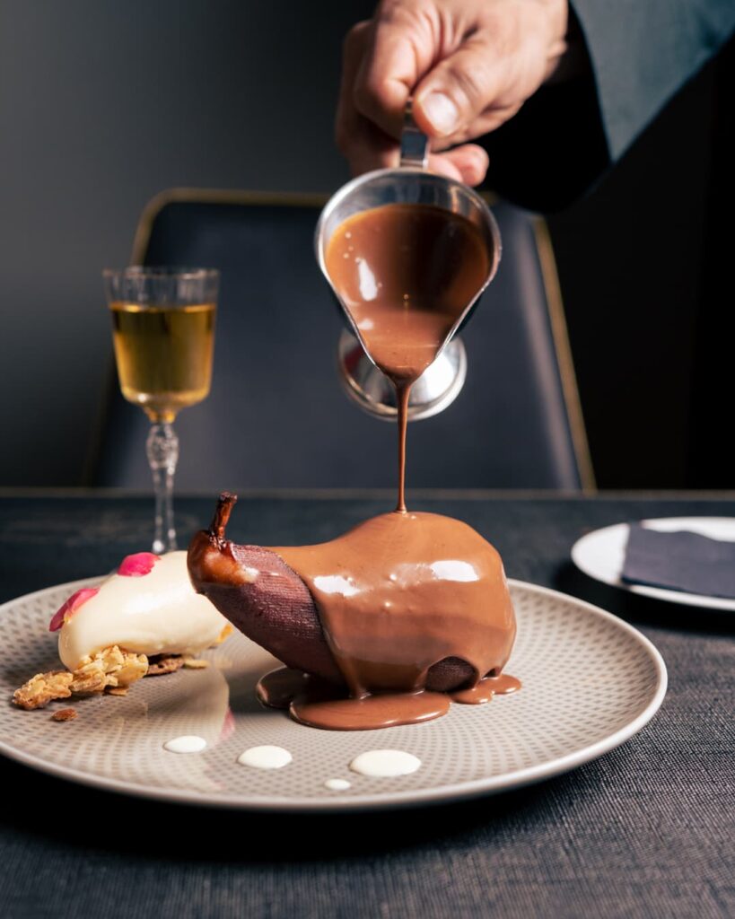 Pera cotta con cioccolato fuso
